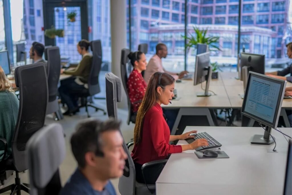 an IT helpdesk team working in an office